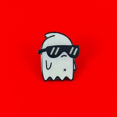 a white ghost wearing sunglasses on a red background