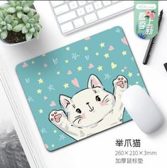 a mouse pad with an image of a cat on it