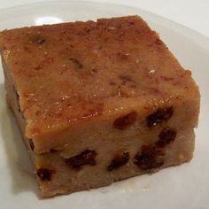 a piece of cake sitting on top of a white plate