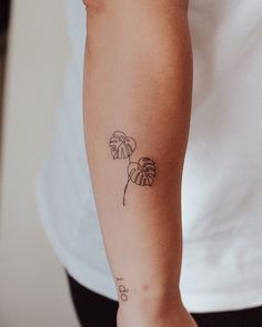 a person with a tattoo on their arm