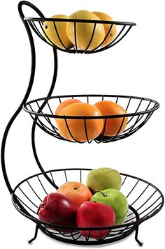 three tiered metal fruit basket with apples and oranges