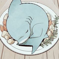 a blue elephant sleeping on top of a white plate with flowers and leaves around it