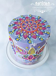 a decorated cake on top of a white plate