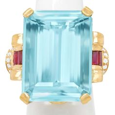 For Sale on 1stDibs - Circa 1940s, 14k, American. This classic Retro ring features a superb 40.50 carat aquamarine accented by .70 carats of fine rubies. The look is confidently Aquamarine And Ruby, Ruby Gold Ring, Retro Ring, Cocktail Rings, Aquamarine, Gold Ring, Gold Rings, Ruby, Ring