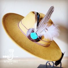 If you’re looking for the perfect accessory to complement your favorite boho style, look no further. This Boho-Style Western Felt Hat w/ Natural Feather & Turquoise Hat Accent by The Jewelry Junkie is absolutely everything that you need. Not only is it easy to incorporate into any and all outfits, but the genuine leather and natural feathers of the band immediately elevate whatever it is you’re wearing. One Size Hat with adjustable inner hat liner (see last photos) The same primary feathers will Turquoise Hat, Western Hat, Leather Hat, Medium Handbags, Packing Jewelry, Western Hats, Leather Hats, Turquoise Howlite, Handbag Straps