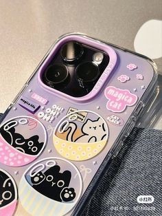 an iphone case with some stickers on it