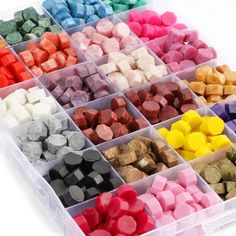 a plastic container filled with lots of different colored candies