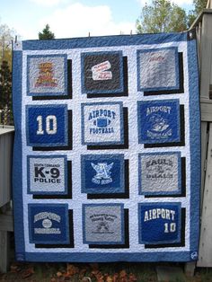 a quilt made to look like an old school football team jersey with patches on it