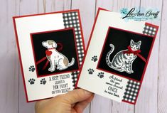 two cards with cats and dogs on them, one has a red ribbon around its neck