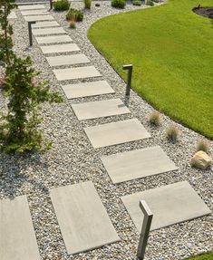 a walkway made out of stones and gravel