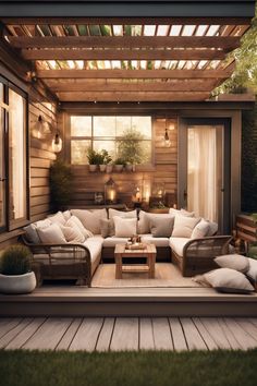 Cozy outdoor patio with comfortable seating and warm lighting under a wooden pergola.