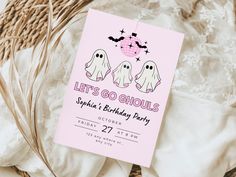 a pink birthday card with two ghostes on it