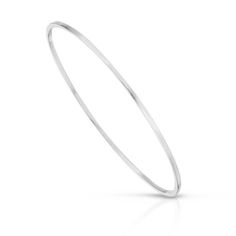 Skinny Stella Bangle is made out of square shaped brass wire but holds a circular shape.Bangle measures 1/16" thick with a diameter of 2.625"Finishes Available: 14K Yellow Gold Rhodium (Silver) Everyday Metal Bangle, Adjustable Hoop Bangle For Everyday, Silver Flexible Round Bangle, Modern Hoop Bangle For Everyday Wear, Minimalist Stackable White Gold Bangle, Modern Hoop Bangle For Everyday, Adjustable Stackable Hoop Bangle, Classic Round Metal Bangle, Modern Flexible Round Bangle