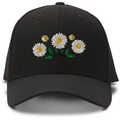 a black hat with daisies embroidered on it