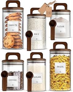 six glass containers with different types of cookies and other food items in each container, all labeled with labels