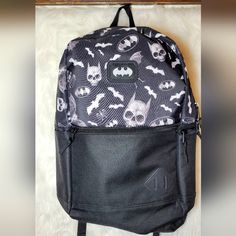 Nwot Dc Comics Batman Backpack- Has One Front Pocket With Zipper. Left Outer Pocket With Zipper. Right Outer Pocket. Very Spacious. Has Never Been Used. Originally Purchased For My Son Who Wrote His Initials Inside And Found Out Skulls Were Not Allowed In Our School District. Backpack Is New. 22 In H X 15 1/2 In W Casual Black Bags With Character Print, Casual Black Bag With Character Print, Black Backpack For Cosplay, Everyday Use Back To School Bags With Character Print, Character Print Backpack For Everyday Use, Everyday Character Print Standard Backpack, Black Halloween Standard Backpack, Bat Backpack, Black Backpack With Character Print