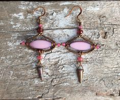 Pink Wire Wrapped Teardrop Earrings, Pink Nickel-free Beaded Drop Earrings, Unique Pink Jewelry For Festivals, Pink Chandelier Earrings For Gift, Nickel-free Pink Dangle Beaded Earrings, Whimsical Handmade Pink Earrings, Handmade Pink Czech Glass Jewelry, Whimsical Pink Handmade Earrings, Vintage Pink Jewelry For Festivals