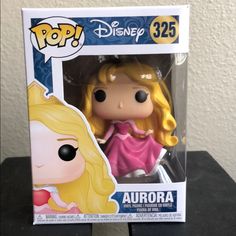 the pop disney princess aurora vinyl figure is in its box and it's ready to be shipped