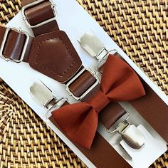 "Your sweet guy will look so dashing when he shows up wearing this burnt orange bow tie and faux leather suspenders set! Our burnt orange bow tie is a great choice for family photos, wedding, ring bearer outfit, birthday celebration or any other special occasion. ❤ *We are only offering 1in wide suspenders at this time, due to their increased stability. Bow ties come in two attachment options- Alligator Clip or Elastic Neckband. Clip on bow ties are best for little guys and babies. The clip atta Bow Tie And Suspenders Set For Father's Day Party, Adjustable Brown Bow Tie For Party, Elegant Brown Belts And Suspenders For Wedding, Dapper Brown Bow Tie For Party, Brown Bow Tie For Wedding And Father's Day, Brown Dapper Bow Tie For Party, Brown Bow Tie For Wedding, Elegant Brown Belts And Suspenders For Party, Brown Bow Suit And Tie Accessories For Party