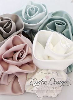 several different colors of flowers are arranged in a circle on a white surface with the words egliee designs wedding written below it