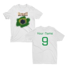 - Custom Brasil Soccer T Shirt: This soccer tshirt features a Brazilian graphic on the front with the bandeira do Brasil, and you can also customize the back with your own name and number! It is perfect for any Brazil fan for either watching your favorite team or playing in a tournament with your team. - Comfortable Combed Cotton Material: Our Brazil shirts are made with combed cotton, giving you a comfortable feel and fit. They also feature side seams, which provide a structured fit and are per Crew Neck T-shirt With Name Print For Fans, Band Merch T-shirt With Team Name And Crew Neck, Band Merch T-shirt With Sublimation Print For Sports Events, Band Merch T-shirt For Sports Events, White Sports Fan T-shirt With Custom Print, Custom Print T-shirt For Fans, White Custom Print Sports Fan T-shirt, Fan Apparel Shirt With Sublimation Print And Crew Neck, Fan Merchandise Custom Print Crew Neck T-shirt