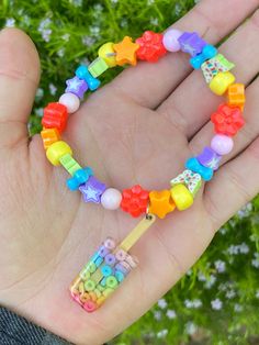 Made from craft beads Multicolor Beaded Dangle Bracelets, Kandi Crafts, Rainbow Stuff, Kandi Inspo, Stim Board, Bracelet Inspo, Craft Beads, Kandi Bracelets, Silly Things