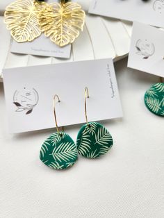 Our Monstera clay collection| Handmade in small batches and painted for a tropical touchChoose from the following styles:Clay Studs- 10mmClay Stud with 2" Brass monstera findingGold stainless steel hoop with 1" clay circle Gold stainless steel hoop with .75" rounded rectangleHypoallergenic, nickel free, and lightweight Clay Hoop Earrings, Clay Studs, Rounded Rectangle, Clay Earring, Earring Collection, Earrings Collection, Polymer Clay Jewelry, Small Batches, Clay Jewelry