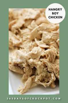 a white plate topped with chicken next to a green background