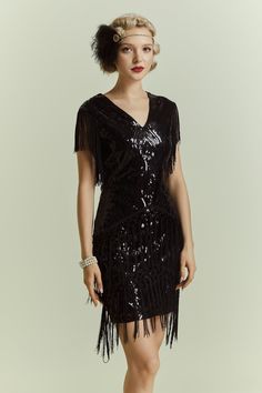 This elegant dress is classic vintage look for a modern woman. The eyecatching design features art deco print and unique vintage style which bring you back to the roaring twenties. Features: Deep v neck style Back zipper closure Tassels arround the shoulder Dazzling beads and sequins Gatsby Dresses, Great Gatsby Dresses, Fringe Flapper Dress, 1920s Dresses, Flapper Dresses, Gatsby Dress, 1920s Flapper Dress, V Neck Style, The Roaring Twenties