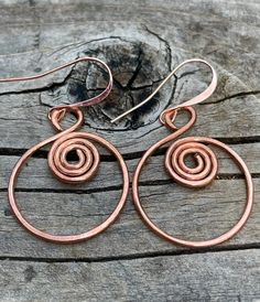 Large wire wrapped solid copper Boho earrings. The solid copper earrings have a beautiful spiral pattern. They are bright and also lightweight. Statement earrings without weighing you down. These earrings are 1 and 3/4 of an inch long and one inch wide. The earwires are solid copper. All my jewelry comes gift boxed with a custom Shelly Mariposa Design butterfly card ready for gift giving, whether it is a gift for you or someone special. Your satisfaction is very important to me. I make every eff Rose Gold Wire Wrapped Copper Wire Earrings, Rose Gold Wire Wrapped Earrings In Copper, Rose Gold Wire Wrapped Earrings, Handmade Spiral Copper Wire Earrings, Bohemian Spiral Copper Wire Earrings, Wire Wrapped Spiral Copper Earrings, Wire Wrapped Copper Spiral Earrings, Copper Spiral Wire Wrapped Earrings, Bohemian Spiral Copper Earrings