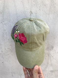 Hand embroidered women hat with floral design / baseball hat for women Color: khaki baseball cap. Design: hand-embroidered pion with wildflowers. Cap size (head circumference): 55 - 67 cm. The quality of the embroidery and baseball cap is superior, I guarantee! ;) I really enjoyed making this, and I hope my customer will enjoy showing it off. 🌿PLEASE NOTE I NEED 2 WEEKS TO EMBROIDER THIS HAT FOR YOU🌿 CHECK OUR OTHER ACCESSORIES 🌸 More Baseball hats: https://www.etsy.com/shop/KazkovaEmbroidery Green Snapback Dad Hat For Spring, Green Cotton Trucker Hat For Spring, Spring Green Cotton Trucker Hat, Adjustable Short Brim Dad Hat For Spring, Green Spring Baseball Cap With Short Brim, Spring Adjustable Dad Hat With Short Brim, Green Dad Hat For Spring, Green Spring Brimmed Baseball Cap, Green Curved Brim Dad Hat For Spring