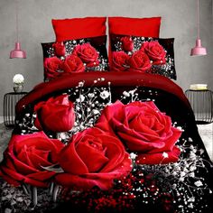 a bed with red roses and white flowers on it