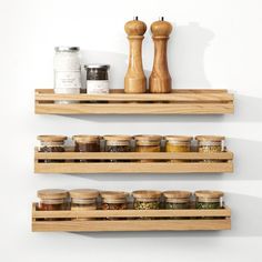 two wooden shelves with spice jars on them