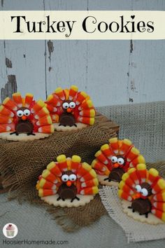 three turkey cookies are sitting on a table