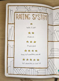 an open book with writing on it and stars in the pages that read ratings system