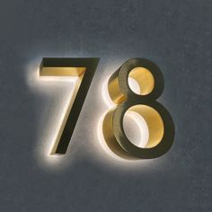 the number 788 is illuminated in gold and black