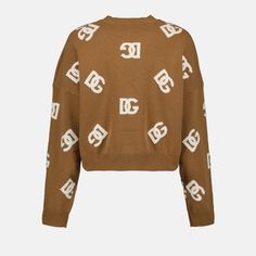 • Round collar
 • Long sleeves
 • Short cut
 • Woven logo
 • Ribbed edges
 • Monogram logo all over
 • Made of wool Cropped Wool Sweater, Dolce Gabbana Sweater, Feminine Chic, Stefano Gabbana, Ralph Lauren Outfits, Dolce E Gabbana, Brown Sweater, Dolce & Gabbana, Knitwear Women