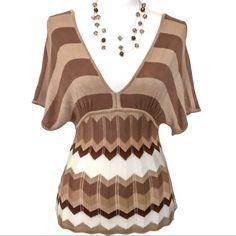 New Bebe Tan, White, Light Brown & Dark Brown Striped Light Knit Short Sleeve Batwing Or Dolman Fitted Top W/A Deep V Front & Back. The Top Is Horizontal Stripes On A Smooth Knit & From The Waist Down It’s More Fitted, In Zig-Zag Lines W/The Knit Also In The Same Pattern. Such A Pretty Top That Can Be Dressed Up Or Down. A Lightweight Knit W/Nice Stretch Made From Super Soft Rayon. - Size Sm ** Brand New W/O Tag! Item In New Condition Just No Tag. All Kinds Of Nwt Items Listed! Bundle2save! Chic Brown V-neck Knit Top, Brown Knit Top For Summer, Brown Knit Summer Top, Knit Batwing Sleeve Tops For Summer, Summer Knit Tops With Batwing Sleeve, Summer Knit Batwing Sleeve Tops, Brown V-neck Knit Top For Spring, Chic Brown Knit Top For Summer, Brown Short Sleeve Knit Top For Summer