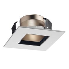 the square recessed light fixture is white and has a black trim around the corner