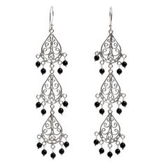 With elegant intricate openwork motifs this pair of dangle earrings is handcrafted from sterling silver. Indonesia's Made Sugi designs the earrings adding petite stones of black onyx to dangle from them. Sterling Silver Filigree Dangle Chandelier Earrings, Sterling Silver Filigree Chandelier Earrings, Traditional Black Sterling Silver Earrings, Elegant Black Filigree Earrings, Black Filigree Dangle Jewelry, Black Filigree Earrings, Black Elegant Chandelier Earrings, Nickel Free, Black Sterling Silver Chandelier Dangle Earrings, Black Sterling Silver Dangle Chandelier Earrings