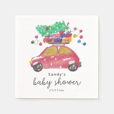 a red car with a christmas tree on top and the words sandy's baby shower