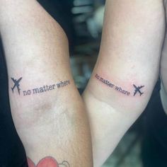 two people with matching tattoos that say no matter where