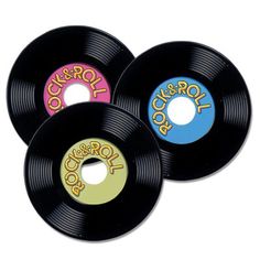 three black records with the word rock and roll on them, all in different colors