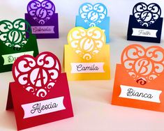 several different colored cards with the names of each letter and numbers on them, all in heart shapes