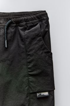 LABEL TECHNICAL PANTS - Black | ZARA United States Zara Workwear Pants With Side Pockets, Zara Bottoms With Pockets, Zara Cotton Bottoms With Pockets, Zara Bottoms With Pockets, Short Length, Zara Cotton Bottoms With Built-in Shorts, Faux Fur Cardigan, Fur Cardigan, Trench Coat Dress, Floral Trousers