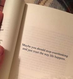 a person holding an open book in their hand with the words maybe you should stop overthiking and just trust the way life happens