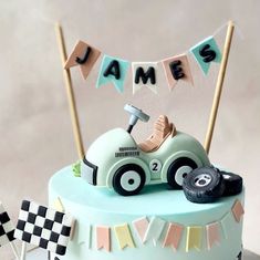 a birthday cake with a racing car on top