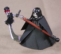 a darth vader figurine with a skull on it