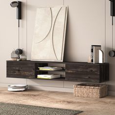 a shelf that has some books on top of it and a painting hanging from the wall