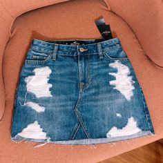 Perfect Condition, Never Worn Mini Denim Skirt! Size 0r Which Is A Waist Size 24! Hollister Skirt, Cheetah Skirt, Y2k Mini Skirt, Mini Wrap Skirt, Holiday Skirts, Mini Denim Skirt, Distressed Denim Skirt, Wrap Mini Skirt, Faux Leather Mini Skirt